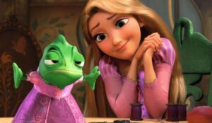 live-action de enrolados é suspenso pela disney princesa loira ao lado de um sapo com vestido