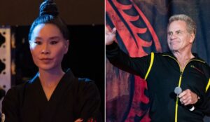 Alicia Hannah-Kim e Martin Kove, atores de Cobra Kai; ela aparece caracterizada como a sensei Kim Da-Eun, enquanto ele segura um microfone em um evento.