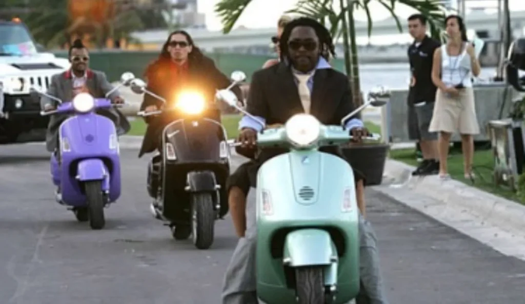 Fergie aparece na garupa da moto verde-clara pilotada por will.i.am, à frente de uma fileira de scooters conduzidas por Taboo e Apl.de.ap, em uma rua asfaltada. Ao fundo, vê-se parte da equipe de gravação, um carro branco estacionado e algumas palmeiras.