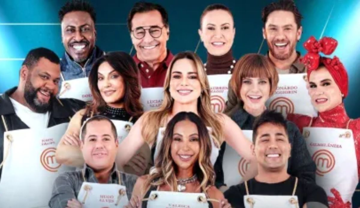 Elenco do MasterChef Celebridades 2025 posando junto, todos usando aventais brancos do programa.