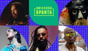 Montagem promocional do Universo Spanta 2026 com fotos de artistas da Noite Preta. A imagem reúne retratos de BK’, Rachel Reis, Os Garotin, Rael e BaianaSystem, distribuídos em círculos coloridos sobre fundo azul estampado. No centro, aparece o logo do festival “Universo Spanta” em verde e amarelo.
