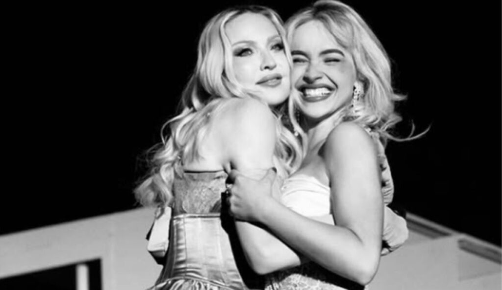 Madonna e Sabrina Carpenter abraçadas durante participação surpresa no Coachella 2026